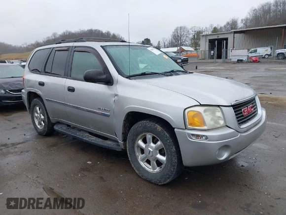 2006 GMC Envoy SLE z VIN 1GKDT13S562187698, wystawiony jako IAAI lot #41808778 z przebiegiem 167 023 mil mil oraz . Historia ofert i sprzedaży dostępna na DreamBid. Obrazek 1.
