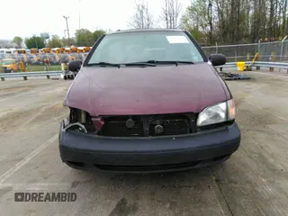 2000 Toyota Sienna LE with VIN 4T3ZF13C8YU209477, listed as a IAAI auction lot 41952970 with 293,084 mi miles. Bid and sale history available at carsss.com. Image 13.