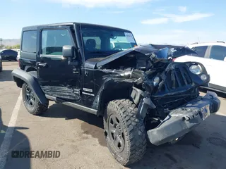 2014 Jeep Wrangler Sport with VIN 1C4AJWAG7EL100344, listed as a IAAI auction lot 42020438 with 87,279 mi miles and . Bid and sale history available at carsss.com. Image 6.