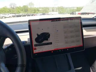 2023 Tesla Model Y Long Range with VIN 7SAYGDEE0PA111430, listed as a IAAI auction lot 42156924 with 35,950 mi miles and . Bid and sale history available at DreamBid. Image 19.