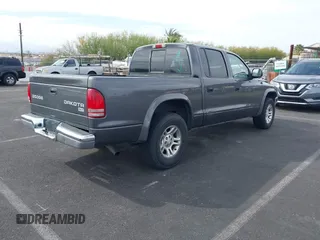 2003 Dodge Dakota SLT with VIN 1D7HL48N93S190381, listed as a IAAI auction lot 41921335 with 75,088 mi miles. Bid and sale history available at carsss.com. Image 4.