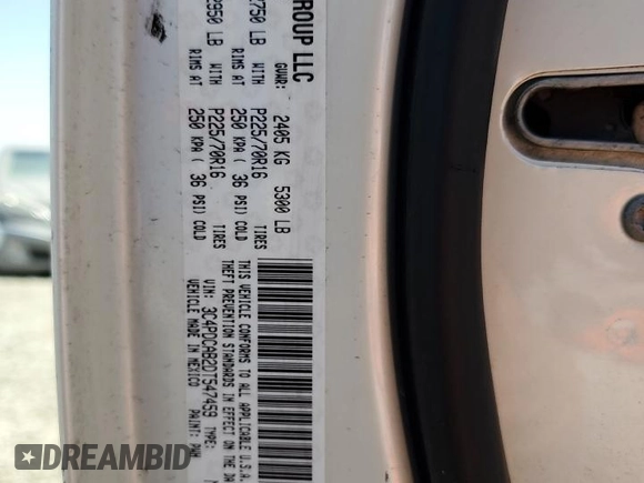 2013 Dodge Journey American Value with VIN 3C4PDCAB2DT547459, listed as a Copart auction lot 61217605 with 116,740 mi miles and Clean title. Bid and sale history available at DreamBid. Image 13.