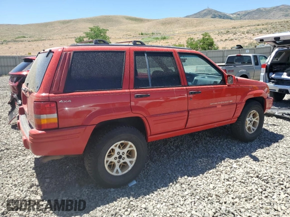 1997 Jeep Grand Cherokee Limited with VIN 1J4GZ78Y7VC573971, listed as a Copart auction lot 61358024 with 171,055 mi miles and Salvage Title. Bid and sale history available at carsss.com. Image 3.