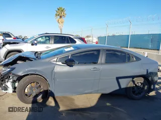 2024 Toyota Prius SE z VIN JTDACACU4R3013796, wystawiony jako IAAI lot #41866441 z przebiegiem 49 837 mil mil oraz . Historia ofert i sprzedaży dostępna na DreamBid. Obrazek 15.