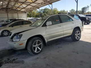 1999 Lexus RX 300 Luxury SUV with VIN JT6GF10U6X0043264, listed as a Copart auction lot 77552034 with 207,941 mi miles and Salvage Title. Bid and sale history available at carsss.com. Image 1.