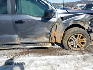 2021 Ford F-150 XL z VIN 1FTEW1C51MFC94173, wystawiony jako IAAI lot #41628222 z przebiegiem 23 266 mil mil oraz . Historia ofert i sprzedaży dostępna na DreamBid. Obrazek 6.