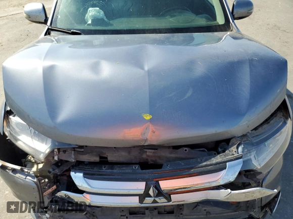 2018 Mitsubishi Outlander ES z VIN JA4AZ3A34JJ003445, wystawiony jako Copart lot #55850775 z przebiegiem 133 644 mil mil oraz Szkoda całkowita • Salvage title. Historia ofert i sprzedaży dostępna na DreamBid. Obrazek 12.