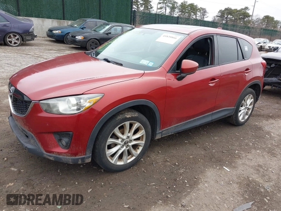 2013 Mazda CX-5 Grand Touring with VIN JM3KE4DE8D0164374, listed as a IAAI auction lot 41820866 with 145,815 mi miles. Bid and sale history available at carsss.com. Image 2.
