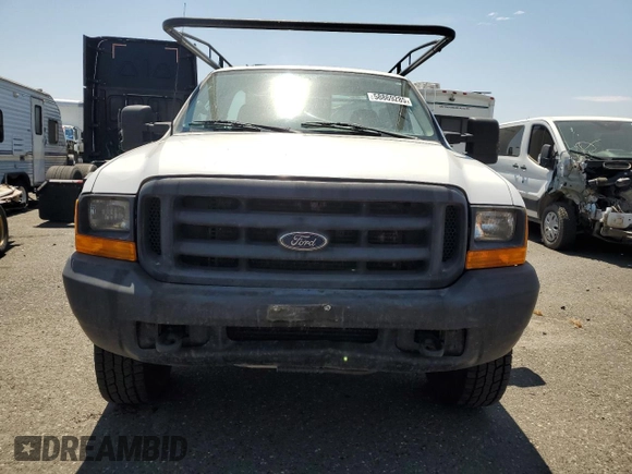 1999 Ford F-250 XL with VIN 1FTNF21L2XEE17853, listed as a Copart auction lot 58869285 with 140,220 mi miles and Clean title. Bid and sale history available at DreamBid. Image 5.