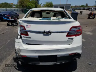 2013 Ford Taurus SE z VIN 1FAHP2D87DG117653, wystawiony jako Copart lot #57232395 z przebiegiem 101 307 mil mil oraz Szkoda całkowita • Salvage title. Historia ofert i sprzedaży dostępna na DreamBid. Obrazek 6.