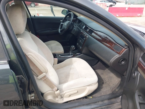 2014 Chevrolet Impala LT with VIN 2G1WB5E33E1180051, listed as a IAAI auction lot 42225939 with 162,161 mi miles and . Bid and sale history available at DreamBid. Image 5.