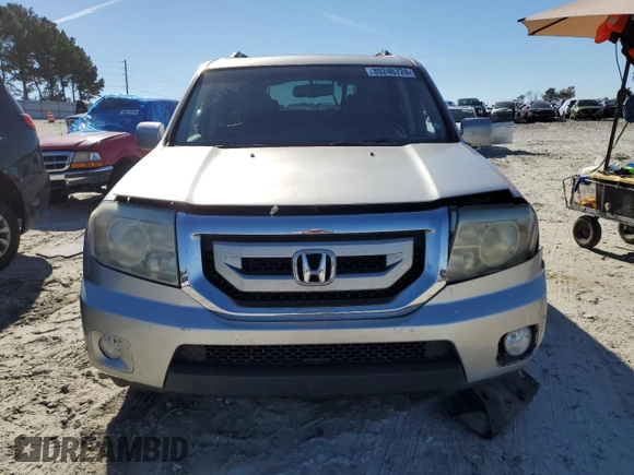 2010 Honda Pilot Touring with VIN 5FNYF3H84AB002687, listed as a Copart auction lot 80246724 with 210,934 mi miles and Salvage Title. Bid and sale history available at DreamBid. Image 5.