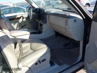 2006 Cadillac Escalade with VIN 1GYEK63NX6R110465, listed as a IAAI auction lot 41268338 with 202,042 mi miles. Bid and sale history available at carsss.com. Image 5.