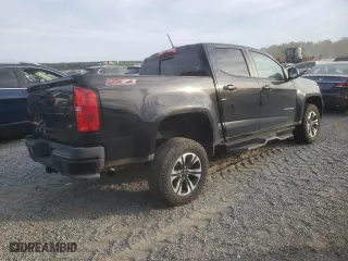 2021 Chevrolet Colorado 2WD Z71 with VIN 1GCGSDEN2M1243233, listed as a Copart auction lot 75515154 with 70,679 mi miles and Salvage Title. Bid and sale history available at carsss.com. Image 3.