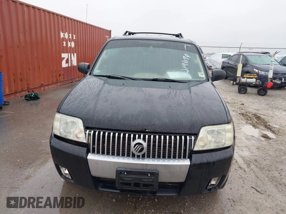 2007 Mercury Mariner Premier z VIN 4M2CU87167KJ19694, wystawiony jako IAAI lot #41496611 z przebiegiem 219 031 mil mil oraz . Historia ofert i sprzedaży dostępna na DreamBid. Obrazek 6.