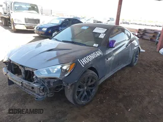 2013 Hyundai Genesis Coupe R-Spec with VIN KMHHU6KJ8DU079718, listed as a IAAI auction lot 42603184 with 105,660 mi miles and . Bid and sale history available at DreamBid. Image 2.