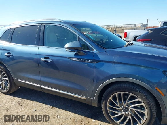 2019 Lincoln Nautilus Reserve with VIN 2LMPJ6LP3KBL51283, listed as a IAAI auction lot 41204810 with 91,184 mi miles and . Bid and sale history available at DreamBid. Image 14.
