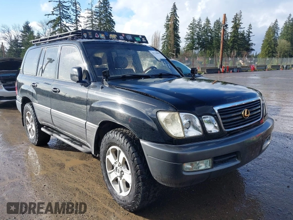 2001 Lexus LX 470 with VIN JTJHT00W613500563, listed as a IAAI auction lot 41730804 with 232,647 mi miles and . Bid and sale history available at carsss.com. Image 1.