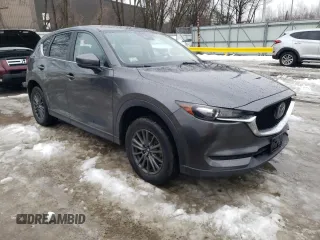 2020 Mazda CX-5 Touring with VIN JM3KFBCM4L0780565, listed as a Copart auction lot 45365425 with 97,524 mi miles and Salvage Title. Bid and sale history available at carsss.com. Image 4.