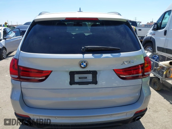 2014 BMW X5 sDrive35i with VIN 5UXKR2C54E0H31217, listed as a IAAI auction lot 41881021 with 163,492 mi miles. Bid and sale history available at carsss.com. Image 16.