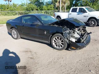 2010 Ford Mustang V6 with VIN 1ZVBP8AN6A5143663, listed as a IAAI auction lot 41855663 with 175,449 mi miles. Bid and sale history available at carsss.com. Image 1.