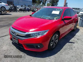 2016 Honda Civic EX-L z VIN 2HGFC1F79GH633213, wystawiony jako IAAI lot #42226171 z przebiegiem 107 023 mil mil oraz . Historia ofert i sprzedaży dostępna na DreamBid. Obrazek 21.