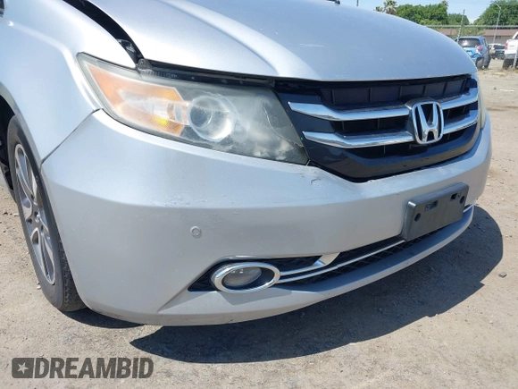 2014 Honda Odyssey Touring with VIN 5FNRL5H91EB068427, listed as a IAAI auction lot 42163315 with 184,134 mi miles and . Bid and sale history available at DreamBid. Image 20.