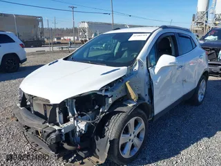 2016 Buick Encore Leather with VIN KL4CJGSB8GB543252, listed as a IAAI auction lot 41489764 with 82,220 mi miles. Bid and sale history available at carsss.com. Image 22.
