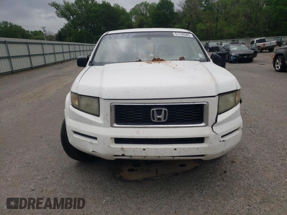 2007 Honda Ridgeline RTX z VIN 2HJYK16377H537549, wystawiony jako Copart lot #51749585 z przebiegiem 261 554 mil mil oraz Szkoda całkowita • Salvage title. Historia ofert i sprzedaży dostępna na DreamBid. Obrazek 5.