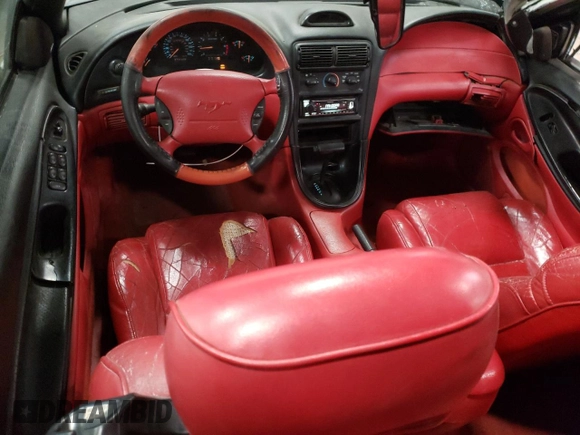 1994 Ford Mustang z VIN 1FALP45T4RF149529, wystawiony jako Copart lot #42222295 z przebiegiem 179 309 mil mil oraz Szkoda całkowita • Salvage title. Historia ofert i sprzedaży dostępna na DreamBid. Obrazek 8.