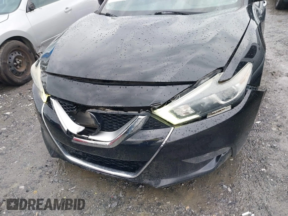 2016 Nissan Maxima SV z VIN 1N4AA6AP6GC400496, wystawiony jako IAAI lot #41908190 z przebiegiem 149 984 mil mil oraz . Historia ofert i sprzedaży dostępna na DreamBid. Obrazek 6.