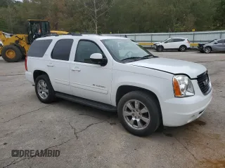 2009 GMC Yukon SLT w/4SA with VIN 1GKEC33349R265859, listed as a Copart auction lot 74012784 with 153,394 mi miles and Clean Title. Bid and sale history available at carsss.com. Image 4.