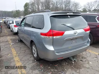 2011 Toyota Sienna LE AAS with VIN 5TDKK3DC0BS073653, listed as a IAAI auction lot 41794038 with 206,504 mi miles and . Bid and sale history available at DreamBid. Image 3.