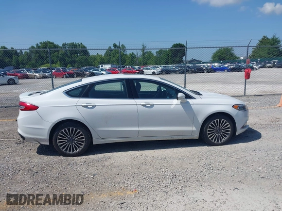 2018 Ford Fusion Titanium with VIN 3FA6P0D98JR134230, listed as a IAAI auction lot 42567084 with 107,459 mi miles and . Bid and sale history available at DreamBid. Image 13.