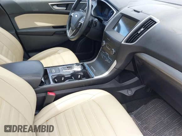 2019 Ford Edge SEL with VIN 2FMPK4J93KBB78771, listed as a IAAI auction lot 42159093 with 80,510 mi miles and . Bid and sale history available at DreamBid. Image 5.