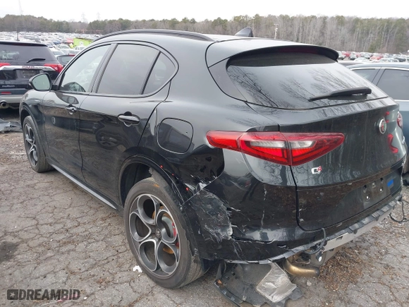 2023 Alfa Romeo Stelvio Ti with VIN ZASPAKBN6P7D56722, listed as a IAAI auction lot 41363962 with 50,073 mi miles. Bid and sale history available at carsss.com. Image 3.