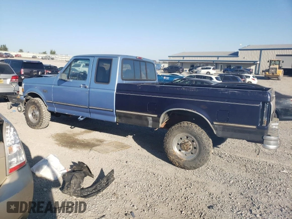 1997 Ford F-250 with VIN 1FTHX26H7VEB07077, listed as a Copart auction lot 75076324 with 126,666 mi miles and Salvage title. Bid and sale history available at DreamBid. Image 2.