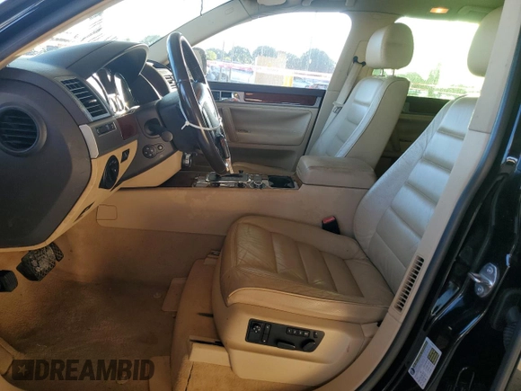 2007 Volkswagen Touareg V6 with VIN WVGZE77L77D002814, listed as a Copart auction lot 82108304 with 140,844 mi miles and Clean Title. Bid and sale history available at DreamBid. Image 7.
