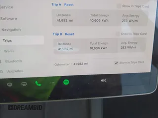 2021 Tesla Model 3 Long Range with VIN 5YJ3E1EB0MF902833, listed as a IAAI auction lot 41854474 with 41,982 mi miles and . Bid and sale history available at DreamBid. Image 7.
