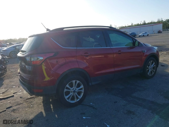 2018 Ford Escape SE with VIN 1FMCU0GD2JUA02221, listed as a IAAI auction lot 41702046 with 92,086 mi miles. Bid and sale history available at carsss.com. Image 4.
