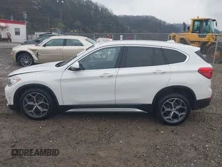 2018 BMW X1 xDrive28i with VIN WBXHT3C33J5L34824, listed as a IAAI auction lot 41977462 with 84,131 mi miles and . Bid and sale history available at DreamBid. Image 14.
