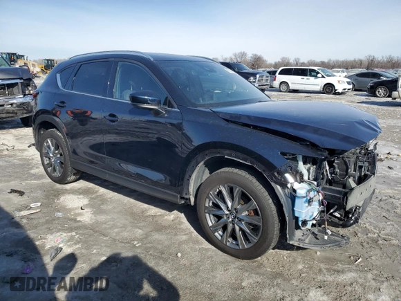 2021 Mazda CX-5 Signature with VIN JM3KFBEY0M0410019, listed as a Copart auction lot 89194805 with 41,489 mi miles and Salvage Title. Bid and sale history available at carsss.com. Image 4.