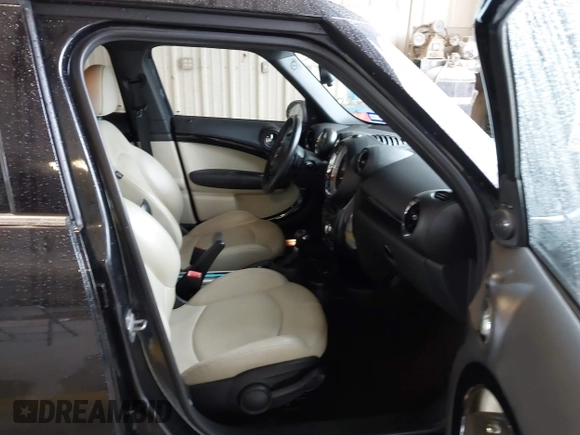 2014 MINI Countryman S z VIN WMWZC5C59EWP36617, wystawiony jako IAAI lot #41550024 z przebiegiem 102 860 mil mil oraz . Historia ofert i sprzedaży dostępna na DreamBid. Obrazek 5.