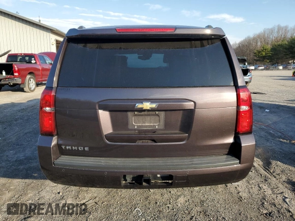 2016 Chevrolet Tahoe LT z VIN 1GNSKBKCXGR365465, wystawiony jako Copart lot #49716705 z przebiegiem Nie podano mil oraz Szkoda całkowita • Salvage title. Historia ofert i sprzedaży dostępna na DreamBid. Obrazek 6.