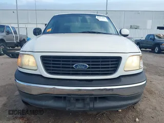 2001 Ford F-150 XLT with VIN 1FTRW07L81KE91672, listed as a IAAI auction lot 42021661 with 200,000 mi miles and . Bid and sale history available at DreamBid. Image 12.