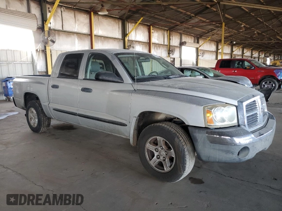 2005 Dodge Dakota SLT with VIN 1D7HE48K15S112874, listed as a Copart auction lot 42560405 with 194,887 mi miles and Salvage Title. Bid and sale history available at DreamBid. Image 4.