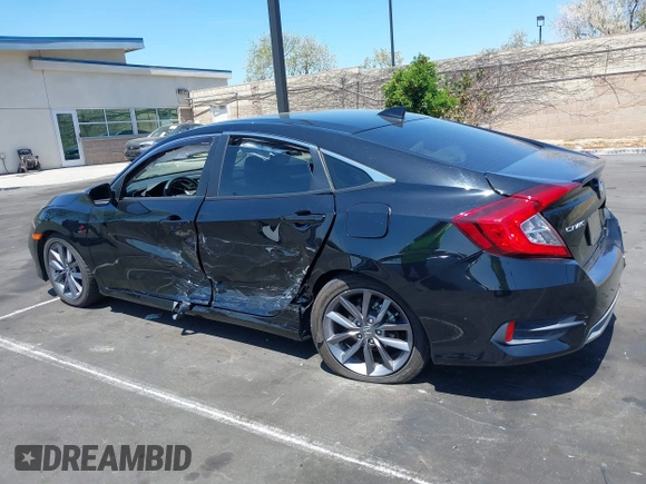 2019 Honda Civic EX z VIN 19XFC1F3XKE215534, wystawiony jako IAAI lot #42100714 z przebiegiem 31 808 mil mil oraz . Historia ofert i sprzedaży dostępna na DreamBid. Obrazek 14.