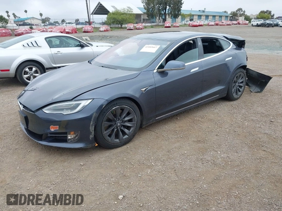 2020 Tesla Model S Long Range with VIN 5YJSA1E29LF363957, listed as a IAAI auction lot 42402667 with 45,058 mi miles and . Bid and sale history available at DreamBid. Image 2.
