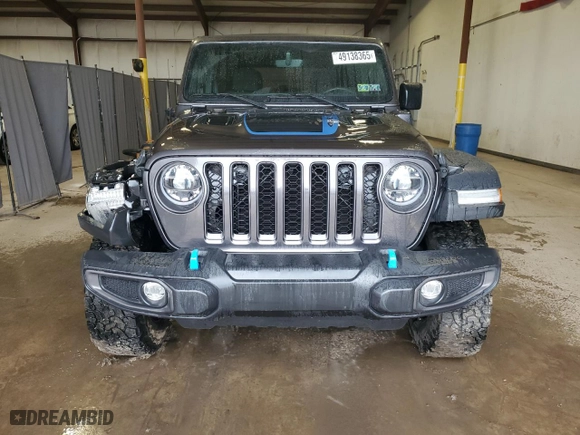 2022 Jeep Wrangler 4xe Unlimited Rubicon with VIN 1C4JJXR65NW274221, listed as a Copart auction lot 49138365 with 25,218 mi miles and Salvage Title. Bid and sale history available at carsss.com. Image 5.