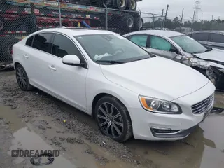 2017 Volvo S60 Inscription with VIN LYV402HKXHB148240, listed as a IAAI auction lot 41618292 with 77,870 mi miles. Bid and sale history available at carsss.com. Image 1.